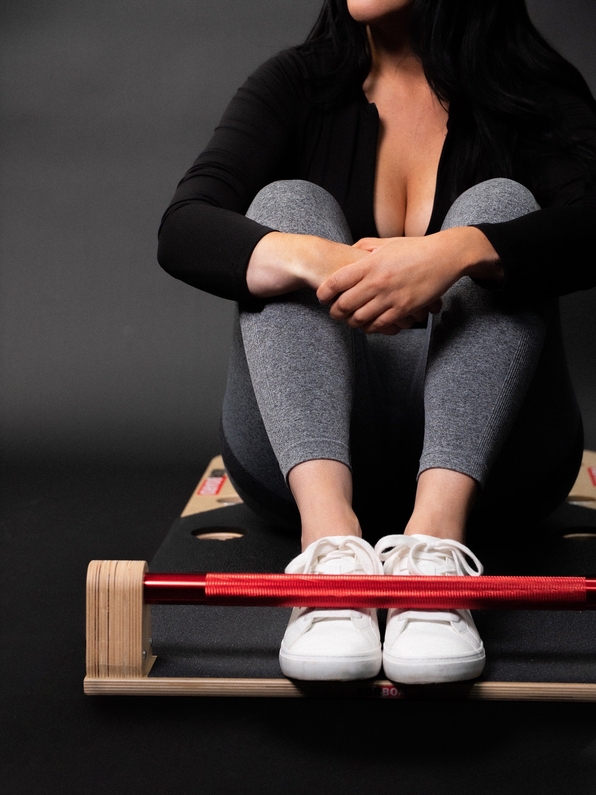 Athlete seated on a KORBOARD